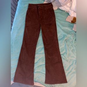 Long flared at the bottom brown ribbed jeans. Super cute and stretchy.